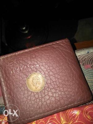 Round Silver-colored Coin And Brown Leather Bi-fold Wallet
