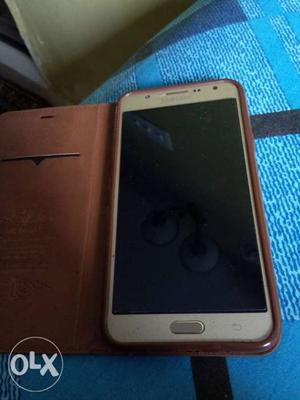 Samsung j7 with free back cover but I had lost