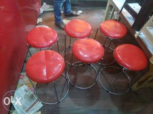 Six Red And Black Metal Stools