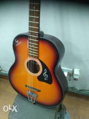 Sunburst acoustic guitar 8.44., very easy