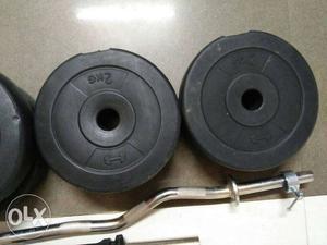 Two Black Weight Plates With Stand