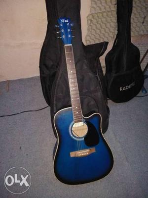 Xtag full jumbo acoustic guitar..with gig bag...