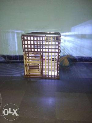 Brown And White Metal Cage