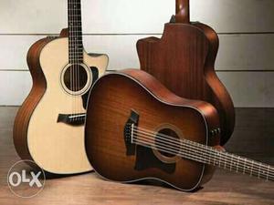 Brown Dreadnought And Two Cutaway Acoustic Guitars
