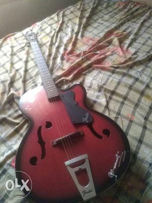 Red And Black Acoustic Jazz Guitar