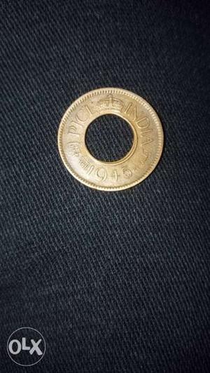 Round Gold-colored Indian Hole Coin