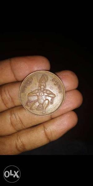 Round Gold-colored Indian Temple Coin