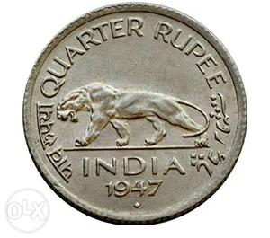 Round Gold-colored Quarter Rupee Indian Coin