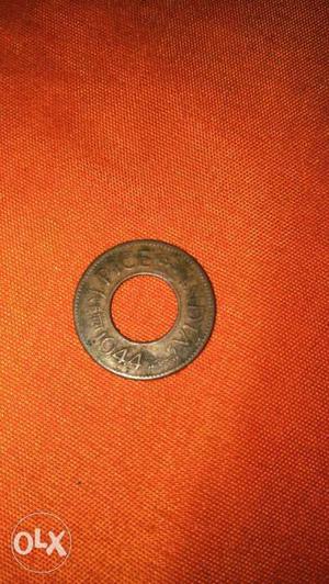 Round Gray Coin With Hole