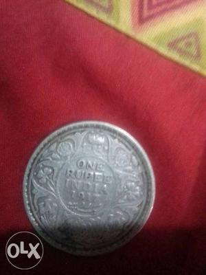 Round Silver-colored 1 Indian Rupeee Coin