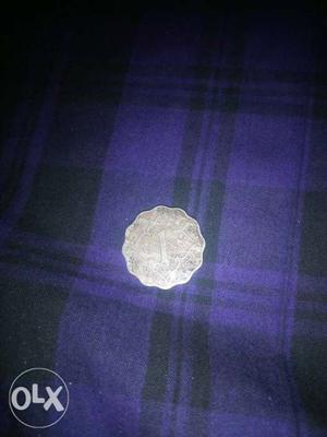 Scalloped Silver-colored 1 Indian Paise Coin