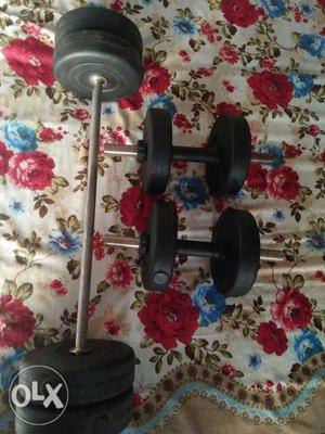 Two Black-and-silver Dumbbells And Barbell