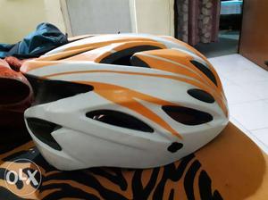 White And Yellow Bike Helmet