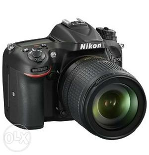 Black Nikon D DSLR Camera with  lens, 1.5 year