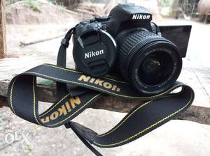 Black Nikon d DSLR Camera With Bag
