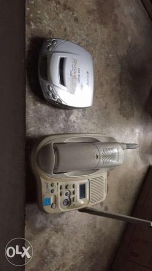 Gray And Beige Wireless Telephone