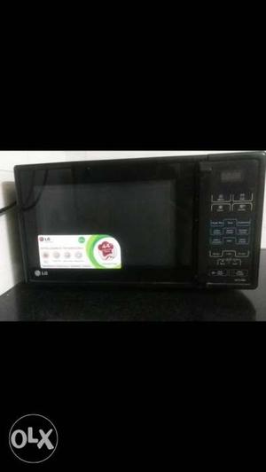 LG 21L Convection Microwave Oven. Auto cook 44 menus.