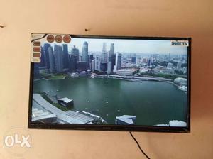 Smart 32" Black Flat Screen TV With Remote
