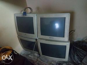 Two Gray CRT TV's