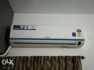 White And Teal Samsung Split-type Air Conditioner