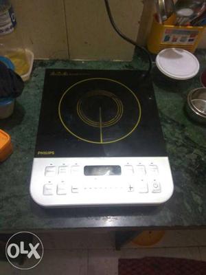 Black And Gray Philips Induction Stove