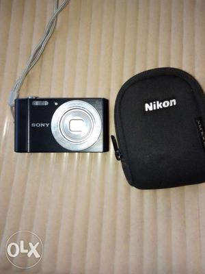 Black And Gray Sony Digital Camera With Case