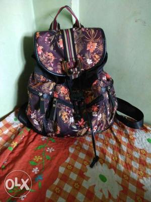 Black And Red Floral Print Backpack