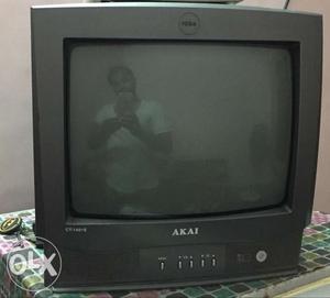 Black CRT Television With Remote