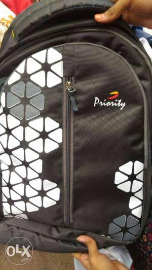 Black, Gray, And White Priority Backpack