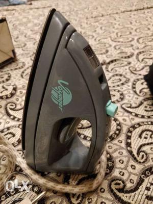 Gray And Teal Clothes Iron