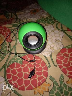 Green And Black Corded Headphones