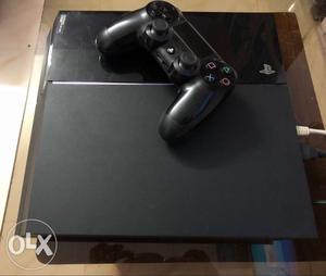 PS4 black 500 GB with v1 controller black.