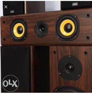 Two Brown And Black Speakers