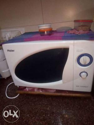 White And Purple Arcelik Microwave Oven