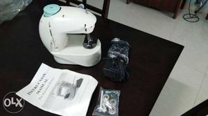 Working mini sewing machine -battery and electric