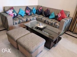Aqua blue 5 seater L shape sofa with two puffies,