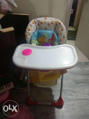 Baby's White And Red High Chair