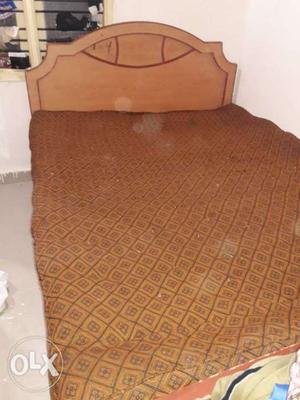 Brown colour wood cot and Brown colour bed good
