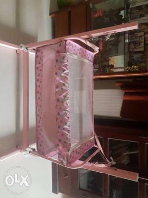 Cradle, baby pink colour in excellent condition.