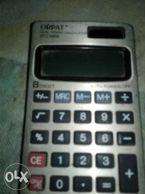 Gray And Black Casio Calculator