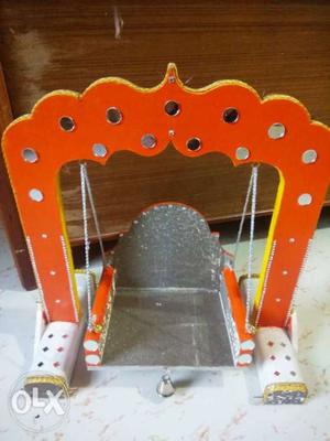 Orange And White Wooden Swing