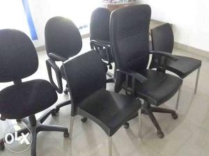 Six Black Rolling Chairs