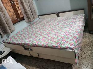 Stylish Double bed of saugon wood with cream