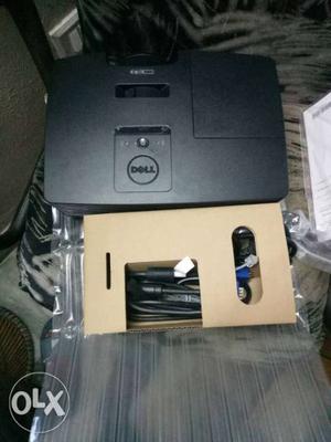 This is an dell projector brand new sirf 2 months