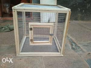 Beige And White Framed Pet Cage
