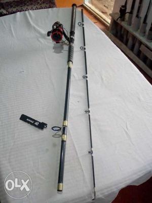 Black Fishing Rod And Reel