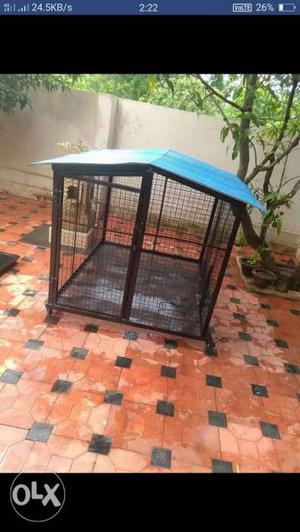 Black Metal Pet Cage With Blue And White Plaid Textile