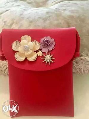 Brand new red sling bag for women