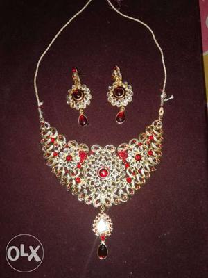 Golden Necklace And Earrings