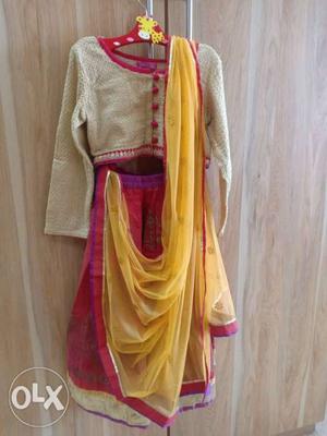 Nice Golden and Red chania choli size 4 to 5 year